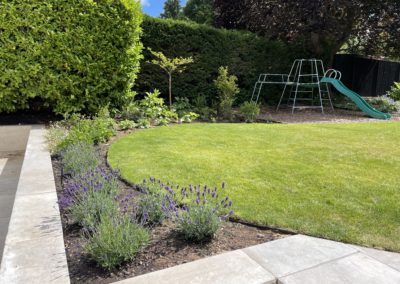 Original retaining wall was rebuilt and clad with porcelain