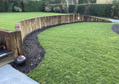 Curved lawn and walls