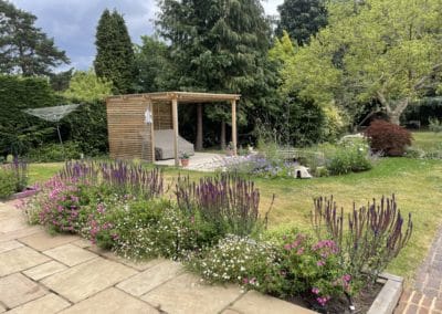 Family garden with a pond, Sutton, Surrey