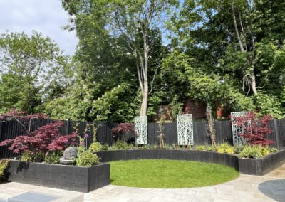 Newly planted circular raised beds