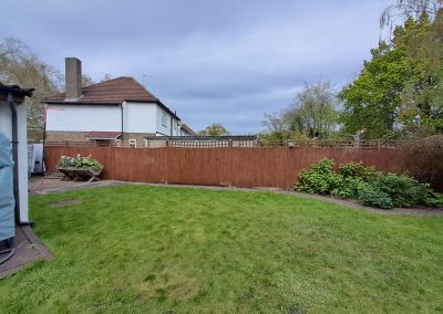 The brown fences are feature in the garden before it was designed. See the black fences for the improvement. The unused area was transformed into a cosy seating area.