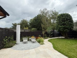 Fences painted black make a big difference to the garden